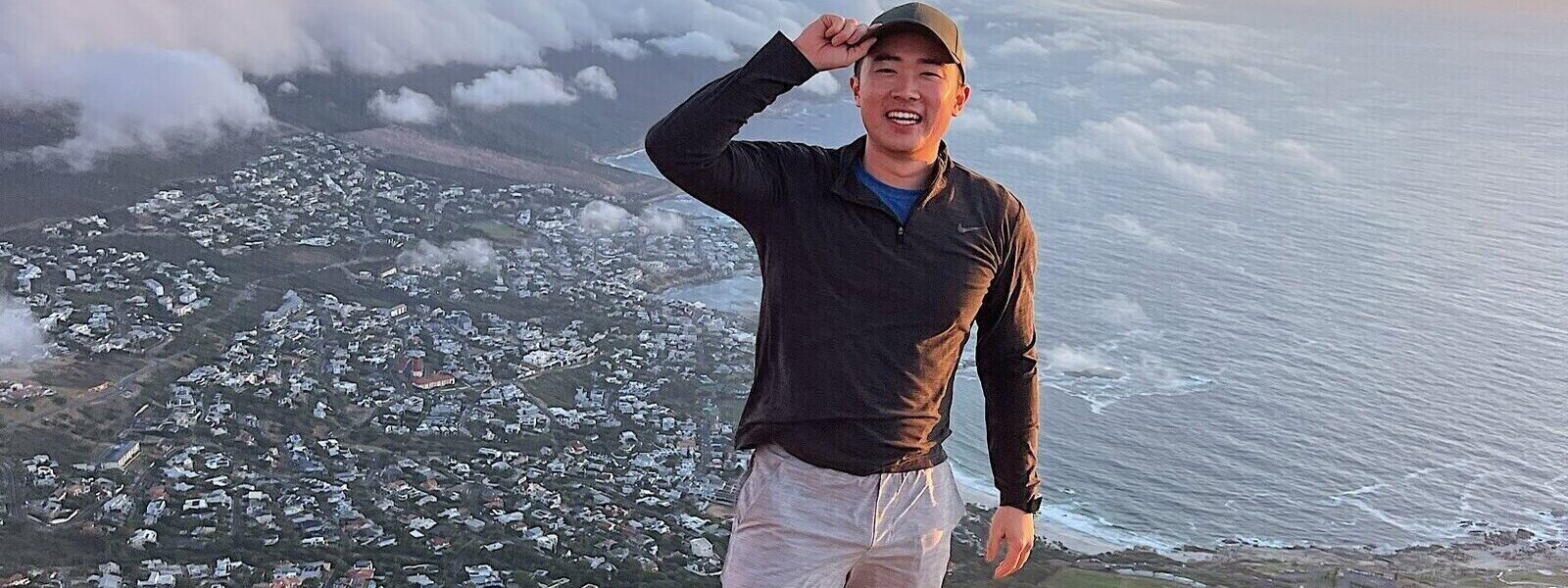 Photo of Social Work & Social Policy student Leonard Wang at Lion's Head Hike in Cape Town, South Africa