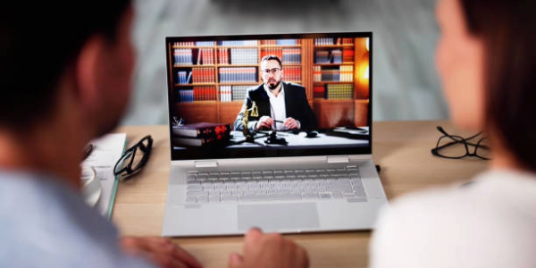 Laptop screen showing a mediation taking place