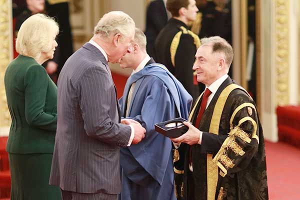 Professor Sir Jim McDonald and Professor Stephen McArthur receive the Queen's Anniversary Prizes award. Professor Sir Jim McDonald and Professor Stephen McArthur receive the Queen's Anniversary Prizes award.
