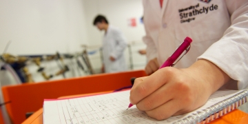 ChemEng Lab Researcher Hand Writing Notes 360x180