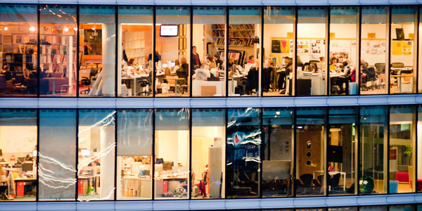People working inside an office building 